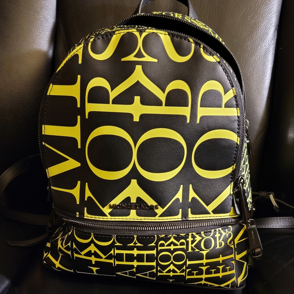 100%Authentic Michael Kors Newsprint Backpack